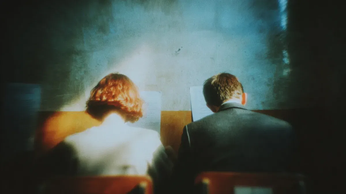 Don't show me your IQ tests, make me laugh People doing an exam