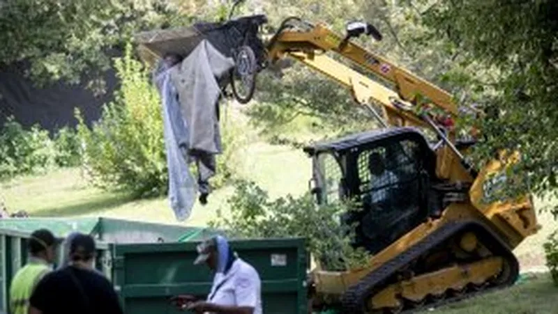 An encampment for the unhoused in Washington D.C. near the Kennedy Center was cleared by employees of the city's Department of Health and Human Services. The residents of the encampment packed up their belongings and left with the help of city outreach workers as well as non-profit employees and volunteers.
